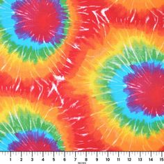 multicolored tie - dyed fabric with an abstract design