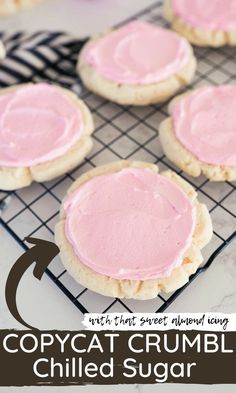 some cookies with pink icing are on a cooling rack and the words copycat crumbl chilled sugar