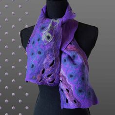 The pumpkin vines are getting long, and there's a chill in the air, so it's time to start thinking Fall / Winter wardrobe. The Purple Sky Eyes Scarf is just so Mela! The handmade nuno-felt scarf measures 56"x8" made with Merino wool and silk for a warm vibrant scarf that's soft against the skin. It features a pattern of eyes cut from silk in chartreuse to royal blue against a vivid purple background. Further embellishments include silk and wool fibers in deep red to blue tones, highlighted with delicate strands of curly silk in coral and silver. This is a one-of-a-kind original from Melasdesign Handmade! Felt Scarf, Nuno Felt Scarf, Green To Blue, Eyes Art, Nuno Felt, Wet Felting Projects, Button Outfit, Felted Scarves, Purple Sky