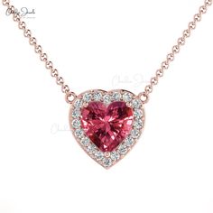 Description Presenting a gorgeous pendant featuring a pink tourmaline set in 14K gold with a diamond halo heart design. The heart-shaped pendant is intricately designed and adorned with a bright pink tourmaline that weighs 0.6 carats. The pink tourmaline diamond is crafted in 3-prongs-setting in the center of the pendant, surrounded by a halo of dazzling diamonds that weigh 0.095 carats. The diamonds are expertly set in 14K gold for durability and are available in different gold options, which a Luxury Pink Birthstone Necklaces, Pink Heart Cut Birthstone Necklace, Pink Heart Cut Necklaces, Perfect Gift For Her, Pink Diamond Necklace With Heart Charm, Pink Gemstone Heart Necklace For Gift, Pink Tourmaline Necklace, Pink Tourmaline Jewelry, Pink Tourmaline Pendant, White Diamond Necklace