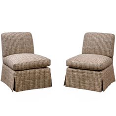 a pair of brown chairs sitting next to each other on top of a white background