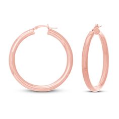 Elegant and essential, these women's round hoop earrings compliment any look, at any time of year. Crafted in 14K rose gold, the hoop earrings secure in place with snap-lock backs. Rose Gold Hoop Earrings Shiny Finish, Rose Gold Hoop Earrings With Shiny Finish, Rose Gold Hoop Jewelry With Shiny Finish, Modern Rose Gold Hoop Huggie Earrings, Rose Gold Hoop Earrings With Polished Finish, Rose Gold Polished Hoop Earrings, Rose Gold Shiny Hoop Earrings, Classic Hypoallergenic Rose Gold Hoop Earrings, Rose Gold Hypoallergenic Hoop Earrings For Anniversary