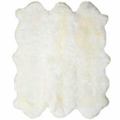 a white sheepskin rug on a white background