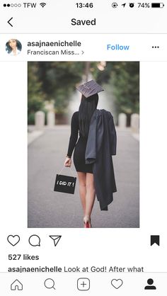 a woman walking down the street wearing a graduation cap and gown