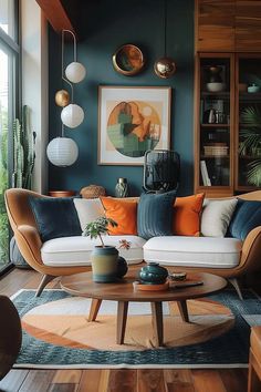 a living room filled with lots of furniture next to a large glass window and potted plant