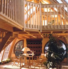 the inside of a house that is very large and has stairs to the second floor