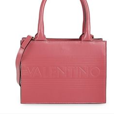 Valentino Leather Tote Updated With Signature Logo Design. Internal Magnetic Closure Goldtone Hardware One Inside Slip Pocket One Inside Zip Pocket One Internal Card Slot Textile Lining Leather Made In Italy Size Handle, 6" Drop Adjustable, Detachable Shoulder Strap, 23" To 25'' Drop 8.5"W X 6.5''H X 4''D Modern Evening Shoulder Bag With Embossed Logo, Evening Leather Bag With Embossed Logo, Evening Shoulder Bag With Embossed Logo, Chic Evening Bags With Embossed Logo, Formal Top Handle Bag With Embossed Logo, Elegant Formal Shoulder Bag With Embossed Logo, Pink Shoulder Bag With Leather Lining For Evening, Pink Leather-lined Shoulder Bag For Evening, Logo Design Color