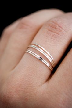 "This item is made to order and will ship after 7-10 business days. That time does not include holidays, weekends or shipping time! This item is hand-crafted and made to order in Portland, OR. * THE ORIGINAL ULTRA THIN RINGS * These stacking rings are perfect for mixing and matching! Either wear them all at once or mix them in with your favorite rings for extra width and sparkle! Each thin wire ring is individually cut, soldered and polished for a beautiful hand-crafted, high-quality ring. I gen Stackable Rings Silver, Stack Ring, Stacking Ring Set, Wire Ring, Delicate Rings, Hammered Silver