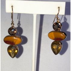 Mookaite, Smoky Topaz & Madeira Citrine Gemstones (25.60 Cts) In 18k Yellow Gold Over Sterling Silver Earrings *Artisan’s Mark **Checkerboard Faceted Face Topaz & Citrine Elegant Yellow Earrings With Natural Stones, Elegant Amber Multi-stone Jewelry, Gold Teardrop Gemstones, Brown Teardrop Gemstone Jewelry, Elegant Brown Jewelry With Stones, Gold Sterling Silver Earrings With Stones, Elegant Multicolor Citrine Jewelry, Gold Multi-stone Dangle Gemstones, Smoky Topaz