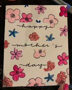 a mother's day card with flowers on it