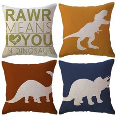 four pillows with dinosaur silhouettes on them in various colors and sizes, each featuring an individual's own name