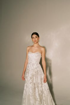 a woman in a strapless wedding dress