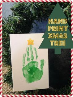 a hand print christmas tree is displayed next to a card that says handprint xmas tree