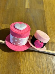 Set of 2 valentines top hats. Cute Mini Cap Hats For Party, Cute Pink Mini Hat As A Gift, Fun Mini Cap Hats As Gifts, Fun Mini Cap Hats For Gifts, Adjustable Brimmed Mini Hat As Gift, Adjustable Mini Hat With Short Brim As Gift, Playful Pink Mini Hats For Gifts, Playful Pink Mini Hat Gift, Cute Mini Hats With Curved Brim As Gifts