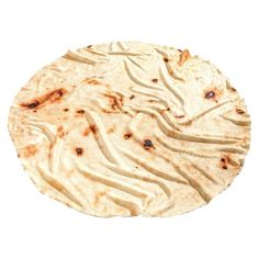 an uncooked tortilla on a white background