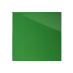 a bright green square tile on a white background, with the top corner slightly down