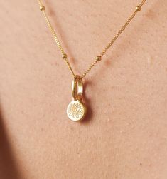 This Lotus necklace represents enlightenment, self-regeneration and rebirth. Flower fact: Lotus flowers always bloom above the waters surface. Add more charms: flower charms, initials charm Rebirth Flower, Lotus Bracelet, Blooming Lotus, Lotus Necklace, Lotus Flowers, Gold Alloys, Meaningful Jewelry, 24kt Gold, Flower Bracelet