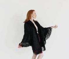 This is a stunning victorian black silk cape, with a shawl cut, floral patterned embossing and intricate fringe. Fitted back panel attaches to an interior belt. Dramatic and beautiful. Interior belt at Waist: 28” (this can be easily extended with a new ribbon should you choose. Condition: good. The interior collar could use some reinforcement, wearable as is but there are a few places is has separated. Visible only from interior. FOLLOW US ON INSTAGRAM FOR DEALS AND SNEAK PEEKS! @Wildthingvintag Best Dressed Award, Chartreuse Dress, Silk Cape, Fit Back, Wiggle Dress, Wild Ones, Gold Chain Necklace, Waist Pants, Black Silk