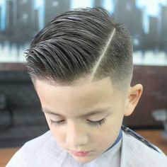 slick haircut with a quiff Popular Boy Hairstyles