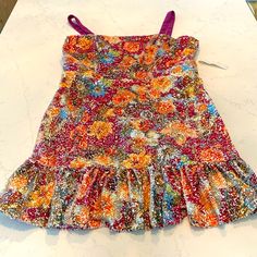 New With Tags. Such A Fun Sequin Dress For Whatever Summer Party You Are Heading To! Beautiful, Bright Color, Floral-Design Sequins Cover The Entire Dress Except The Chiffon Fuchsia Straps. Size Medium Fits Like 8-10. Straight Neckline With Defined Waistline And Ruffle Hem. Zipper In Middle Of Back. Multicolor Sleeveless Mini Dress For Cocktail, Fitted Multicolor Summer Dress, Multicolor Party Sundress, Fitted Multicolor Mini Dress For Summer Parties, Spring Party Sundress, Multicolor Mini Dress For Garden Party, Multicolor Sundress For Cocktail Occasions, Multicolor Sundress For Cocktail, Floral Print Mini Dress For Cocktail And Party Season