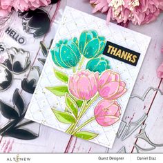 a card with flowers on it and some other cards in the background that say thanks