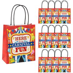 there is a carnival fun gift bag and 10 small bags with tags on each one