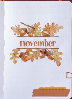 an open notebook with the words november written on it