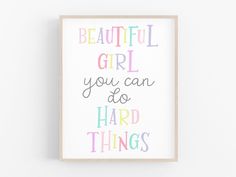 a colorful print with the words, beautiful girl you can do hard things on it