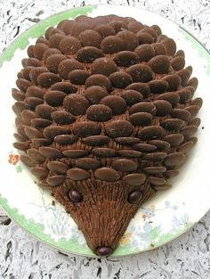 a cake shaped like a hedgehog on a plate