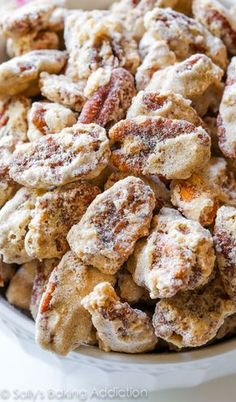 a bowl filled with some kind of food covered in powdered sugar and other things