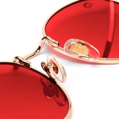 Frame Style Highlights: Gender: Unisex Frame: Gold Metal Wireframe Lens Color: Red UV Rating: UV400 Fit / Size: Small - Medium In the Box: Sunglasses & Microfiber Pouch Lens Width: 50mmLens Height: 45mmBridge Width: 15mmArm Length: 125mm Red Sunglasses With Uva Protection For Summer, Red Sunglasses With Uva Protection, Red Tinted Shield Sunglasses For Beach, Trendy Red Aviator Sunglasses With Gradient Lenses, Red Cat Eye Sunglasses With Uva Protection, Trendy Red Mirrored Sunglasses, Modern Red Aviator Sunglasses With Uva Protection, Red Mirrored Cat Eye Sunglasses For Summer, Modern Red Aviator Sunglasses With Uv Protection