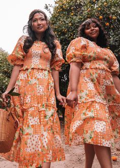 Hey There, Cutie Your new go-to ensemble for a season filled with sunshine and smiles! Picture yourself twirling through fields of blooming flowers, the vibrant orange hue of this dress perfectly complementing the season's lively spirit. Pair with sandals or white high top converse for a versatile and oh-so-cute style. Smocked bodice Square neckline Elastic puff sleeves Model Details Content + Care 100% Cotton Machine Wash Cold Try On Video Orange Blossom Dress Try On Video XS & XL Orange Blossom Dress, Orange Fruit Dress, Festive Floral Print Orange Dress, Festive Orange Floral Print Dress, Orange Embroidered Summer Dress, Fashion Wedding Guest, White High Top Converse, Dresses Church, Cocktail Dress Style