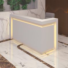 a white reception table with lights on it in a lobby area that has marble floors and walls