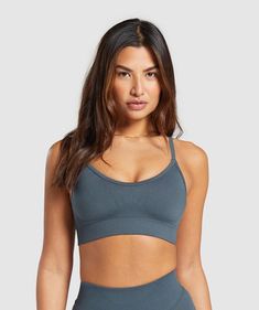 IT GIRL OF THE HIIT WORLD Strong, unapologetic, and a total baddie. We know you need a fit that matches your energy, and Sweat will make sure you look & feel confident before, during and after your workout (or hot girl walk). • Premium DYNMC™️ fabric is soft, breathable and durable• Comfy shaped ribbed seamless underband• Internal cup opening with removable cups• Adjustable straps to customise your fit SIZE & FIT• Light support• Model is 5'8" and wears a size XS MATERIALS & CARE• 84% Girl Walk, Seamless Sports Bra, It Girl, Feel Confident, Shirts Tops, Adjustable Straps, Sports Bra, Energy, Bra