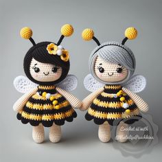 two crocheted dolls dressed in bee costumes