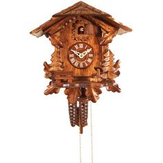 a wooden cuckoo clock with chains hanging from it's sides on a white background