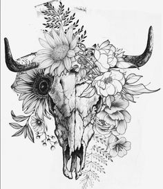 a cow skull with flowers on it's head is shown in black and white