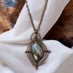 Elevate Your Style With This Stunning Handcrafted Boho Chic Copper Wire-Wrapped Natural Labradorite Pendant Necklace. Each Piece Is Truly One-Of-A-Kind, With The Natural Labradorite Stone Showing Unique Flashes Of Color And Organic Patterns. No Two Are Exactly Alike, Ensuring You Wear A Special Piece Of Jewelry. Labradorite Is Known For Its Mystical Energy, Believed To Protect And Ground The Wearer, While Also Enhancing Intuition And Inner Strength. Perfect For Any Boho-Chic Lover, This Pendant Viking Wire Wrap Jewelry, Wire Wrapped Jewelry Stones, Wire Wrapped Rocks, Wire Wrapped Jewelry Rings, Crystal Wrapping, Wire Wrapped Jewelry Pendant, Antique Copper Jewelry, Copper Wire Crafts, Energy Spiritual