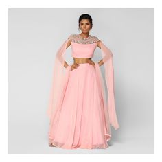 This crop-top with net neckline, pleated cape sleeves, side zip, back hooks features nalki, beads and French knot embroidery on the neckline. It is paired with matching flared skirt with can-can underlining and dupatta with satin border. . . . . . . . . . . . . . #diyaonline #diyaskin #new #lehengacholi #lehenga #ootd #styleinspo #indianwear #indiandesigner #party Pastel Pink Outfit, Knot Embroidery, Sangeet Outfit, French Knot Embroidery, Cape Gown, Velvet Clothes, Sequin Outfit, Peplum Styling, Indian Blouse