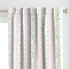 pink and green striped curtains with leaves on them