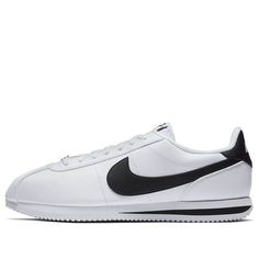 First designed in 1972 by Bill Bowerman, the Nike Cortez has been a iconic silhouette in the world of sneakers. The Cortez Basic Leather is a modern take on the classic design, with a white leather upper and visible stitching. The low-cut collar ensures flexible movement, and the EVA wedge midsole provides responsive cushioning. The herringbone pattern on the outsole adds durability, and the black accents on the Swoosh, heel, and tongue tab give this sneaker a modern edge. (SNKR) Classic Nike Custom Sneakers With Rubber Sole, Classic Custom Sneakers With Rubber Sole For Streetwear, Nike Modern Custom Sneakers With Vulcanized Sole, Modern Nike Custom Sneakers With Vulcanized Sole, Nike Custom Sneakers With Vulcanized Sole, Classic White Sneakers With Branded Insole, Nike Modern Custom Sneakers With Gum Sole, Modern Nike Custom Sneakers With Gum Sole, Classic Nike Sneakers With Contrast Sole