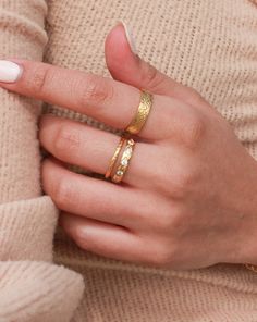 Discover the charm of our Lux Ring. Made with a beautiful hammered style, this band is a must have for a ring stack look. Best part? The Lux ring is not only waterproof but also offers excellent tarnish resistance. It's sure to retain its shine and quality! • Gold Plated Stainless Steel (PVD Plating)• Size Options: US 6 - 8• 5mm