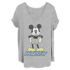 a women's mickey mouse t - shirt with the word mickey printed on it