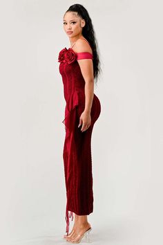 Introducing our Enchanting Rose Off-Shoulder Dress – a sartorial symbol of elegance with a flirtatious touch. Available in passionate red and classic black, this dress features an exquisite off-shoulder neckline adorned with a row of delicate handcrafted roses, bringing a romantic allure to any occasion. The textured fabric, with its intricate patterned lace, hugs the contours of your figure, celebrating your form with its sleek midi length. Flowing tulle streamers cascade from the waistline, ad Tulle Streamers, Blue Zone, Blue Zones, 3d Rose, Cotton Maxi, Maxi Dress Cotton, Jumpsuit Fashion, Zambia, Textured Fabric