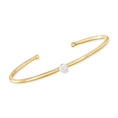 Ross-Simons - 5-5.5mm Cultured Pearl Cuff Bracelet in 14kt Yellow Gold. 7". RS Pure. Modern designs that complete your outfit and complement your personality. Elegant and understated, this simple bracelet features a lovely 5-5.5mm cultured freshwater button pearl centered on a gleaming 14kt yellow gold cuff. Slip-on, white pearl cuff bracelet. Pearl birthstones are the perfect gift for June birthdays. Adjustable Classic Yellow Gold Pearl Bracelet, Classic Adjustable Yellow Gold Pearl Bracelet, Gold Pearl Bangle Cuff Bracelet, Classic Adjustable Gold-plated Cuff Bracelet, Classic Yellow Gold-plated Cuff Bracelet, Pearl Cuff Bracelet, Pearl Birthstone, Pearl Cuff, Yellow Gold Jewelry