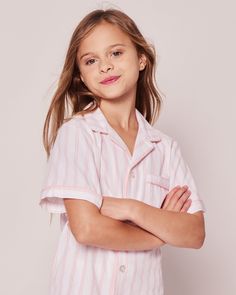 The sleepwear is made from the finest quality cotton and blended with just enough inherently flame retardant fiber to allow it to pass strict CPSC flame retardant laws without using harmful chemicals. The fabric is brushed for added softness, making the sleepwear feel absolutely luxurious, getting cozier after each wash.In our luxurious sleepwear, your little one will be tucked in love and off to dreamland. Bonne nuit. Luxurious Sleepwear, Pajama Short Set, Pajama Short, Luxury Sleepwear, Pink And White Stripes, Flame Retardant, Shoe Size Conversion, Short Pajama Set, Harmful Chemicals