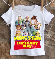 a white shirt with an image of toy story characters on it and the words kingston birthday boy