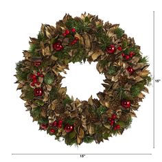 a christmas wreath with pine cones, holly berries and pomegranates on it