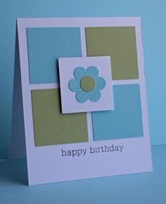 a happy birthday card with a flower on the front and blue squares in the back