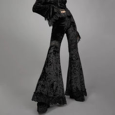 Look stylish and fashionable in these women's black floral velvet lace trim elastic high waisted flare pants. crafted from a blend of polyester and cotton, these goth-inspired pants are perfect for everyday fashion. Cheap Black Lace Bottoms, Gothic Pants Vampirefreaks, Ghoulia Yelps Pants, Cheap Black Bottoms With Lace Trim, Luxury Black Bottoms For Alternative Fashion, Black Flare Pants Hippie, Luxury Black Bottoms With Lace Trim, Luxury Black Velvet Bottoms, Flared Pants Aesthetic